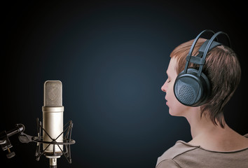 girl announcer speaks into a microphone