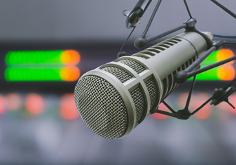 Professional microphone and sound mixer in radio station studio