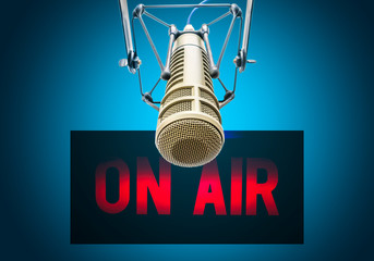 Professional microphone in radio station studio on air