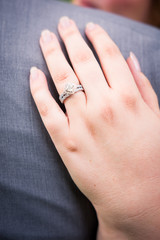 Bride displays wedding ring