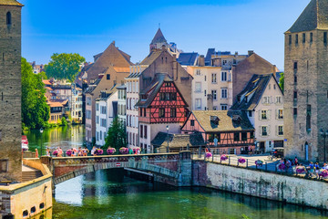 Strasbourg, France, Alsace. The Ill river and the Petite France quarter. - obrazy, fototapety, plakaty