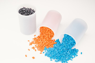 Plastic granules close up for holding,Colorful plastic granules with white background. and dollar...