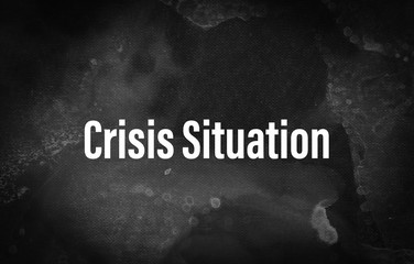 Crisis situation word on blackboard