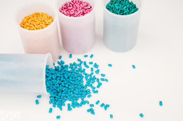 Plastic granules close up for holding,Colorful plastic granules with white background. and dollar...