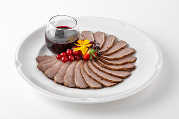 Sliced meat delicacies. Delicious beef, pork and poultry. Banquet festive dishes. Gourmet restaurant menu. White background.