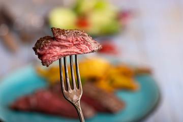 slice of steak on a fork