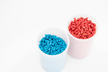 Plastic granules close up for holding,Colorful plastic granules with white background. and dollar...