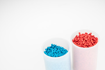 Plastic granules close up for holding,Colorful plastic granules with white background. and dollar money,Plastic Business,Plastic industry.