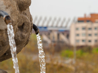 PIPE OF A WATER SOURCE ON THE TOLEDO BRIDGE OF MDRID. TO THE FUND MADRID RÍO AND VICENTE CALDERON STADIUM IN DEMOLITION