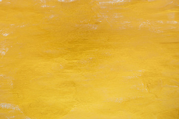 Gold background or texture and gradients shadow. The texture of black gold