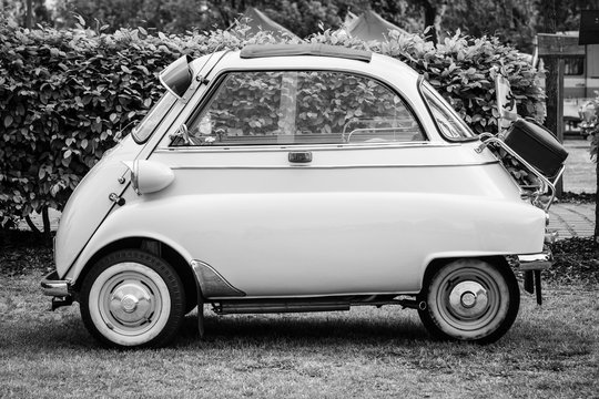 PAAREN IM GLIEN, GERMANY - MAY 23, 2015: Microcar BMW Isetta 300. Black and white. The oldtimer show in MAFZ.
