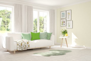 White living room with sofa and summer landscape in window. Scandinavian interior design. 3D illustration
