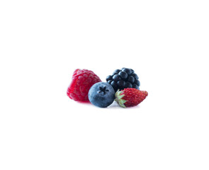 Berries isolated on white background. Ripe blueberries, blackberries, raspberries and wild strawberries. Background of mix berries with copy space for text. Mix berries on white background.