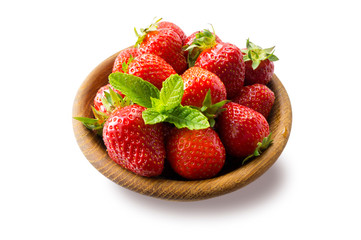 Strawberries in bowl isolated on white background. Ripe strawberries close-up. Background berry. Sweet and juicy berry with copy space for text. Strawberries on white background. Various fresh summer