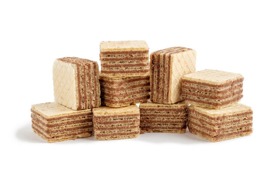 Pile of wafer biscuits cubes isolated on white background