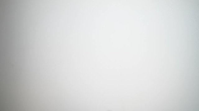 Silhouetted man hands scratch glass, horror movie style shot. Two palms scratch nails over thick glass, trying to get inside room. Scary scene of nightmare