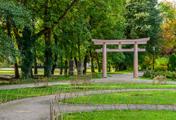 Sightseeing of Poland. Oliwa park - a picturesque Japanese-style city Park, Traditional japanese wooden Torii gate in Gdansk, Poland