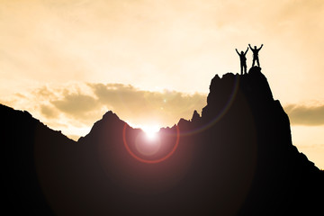 successful and determined people at the summit
