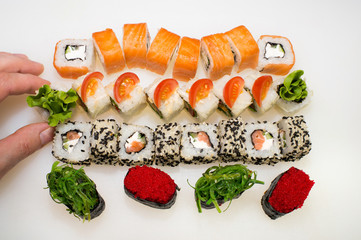 A large combination set of Japanese salmon rolls