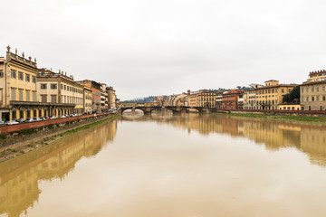 Beautiful Sights of Ponte Vecchio Bridge and Arno River in Florence, Italy.