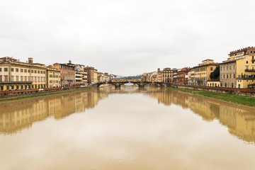 Beautiful Sights of Ponte Vecchio Bridge and Arno River in Florence, Italy.
