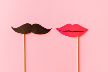 Photo booth props lips and Black Mustache isolated on pink background