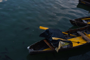 Fototapeta na wymiar closeup of a brown wooden boat in the lake in nainital India