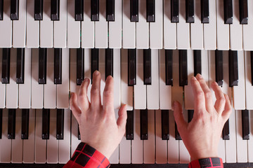 Organist playing a pipe organ, Top view