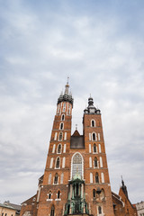 Fototapeta na wymiar St. Mary's basilica in main square of Krakow. Poland's historic center, a city with ancient architecture. Cracow, Poland.