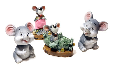A statuette of mouses isolated. A ceramic figurine mice isolated.