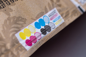 Labeling on the package close-up. Сolored circles and numbers.