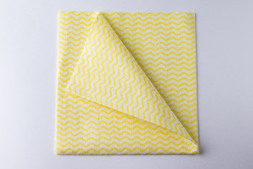Folded napkin with curved corner