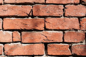 Old, rustic red brick wall. Background, texture, pattern