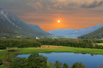 Mountain lake sunset landscape view, Norway.