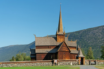 Fototapeta na wymiar Wooden church Lomskyrkja in Lom, Norway, one of the biggest stave churches in Norway. Church dates back to 1158-59.