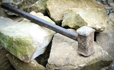 big hammer and stones close up