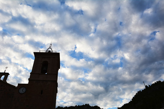 Tower of a church with nice clouds