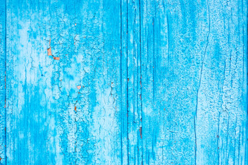Fototapeta na wymiar Вlue wooden background. Board with the texture of the old cracked paint