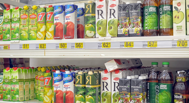 Russia, St. Petersburg 03,04,2014 Juices in packs on the supermarket shelf