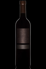 Bottle of wine on a black background illuminated by the outline