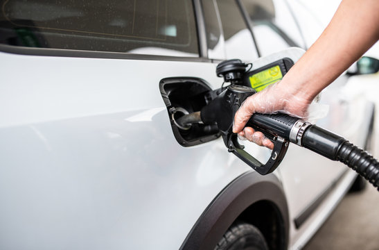 refueling the car, refueling instructions - gas station background