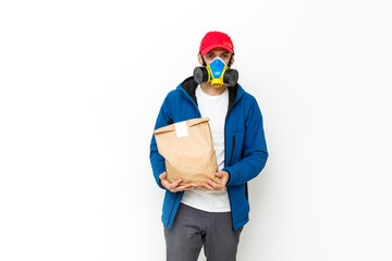 food delivery man Wearing Medical Mask. Corona Virus Concept