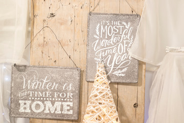 Christmas decorations in nordic style hanged on a wooden wall
