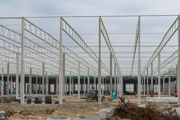 construction of anconstruction of a warehouse - skeletal structure - roof membrane industrial hall - steel structure