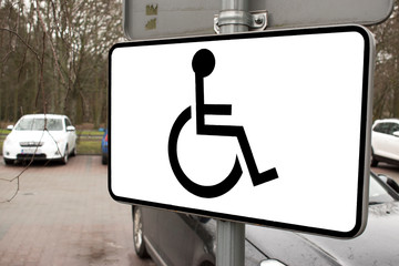 Disabled sign close-up in the city.