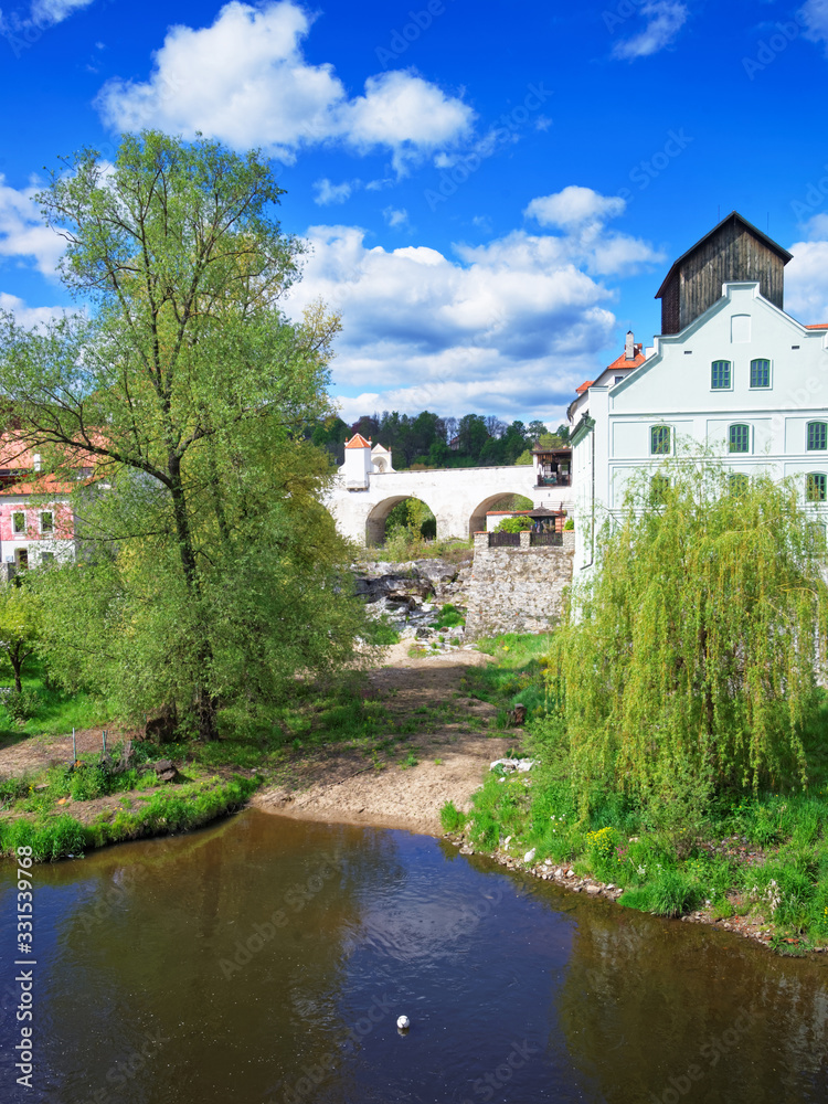 Wall mural arch bridge and vltava river in cesky krumlov