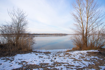 Beautiful winter landscape of a frozen river