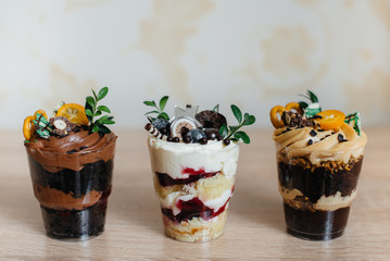 Very beautiful and appetizing traily closeup on table with space for signatures. Cake