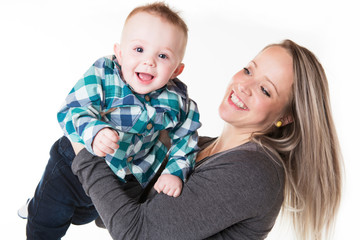 A mother with the baby boy on studio white background