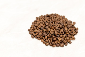 Pile Of Coffee Beans Isolated Above White Background